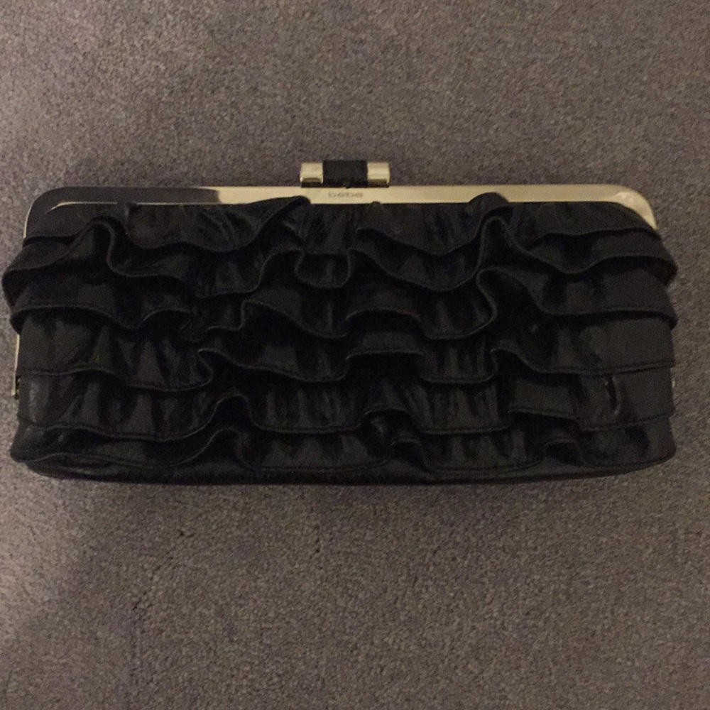 Bebe Ruffled black clutch
